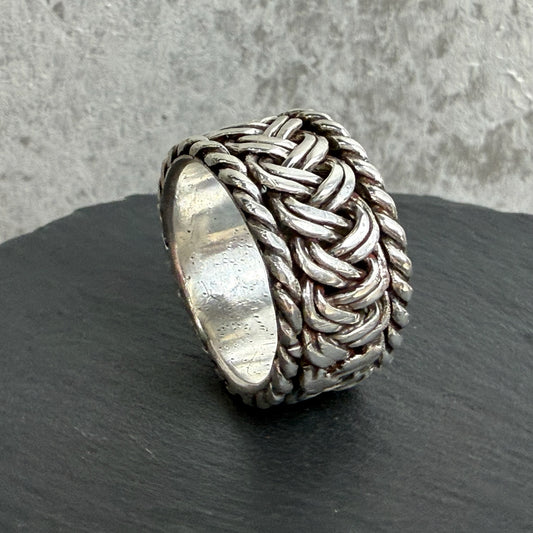 The Rotation Ring — Handwoven Silver Band